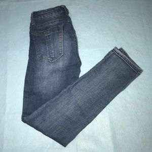 medium wash jeans with some rips